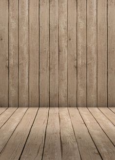 an empty room with wood flooring and planks on the walls is seen in this image