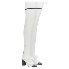 CHANEL 2023 Runway black toe cap white bow CC fishnet thigh high heels EU38.5 Reference: AAWC/A00549 Brand: Chanel Designer: Virginie Viard Collection: 2023 - Runway Material: Mesh, Leather Color: White, Black Pattern: Solid Closure: Elasticated Lining: White Leather Extra Details: CC pearl logo at back at heels. Made in: Italy CONDITION: Condition: Excellent, this item was pre-owned and is in excellent condition. SIZING Designer size: EU38.5 Size reference: EU38.5 / US8.5 / UK5.5 / JP26 MEASUREMENTS: Footbed length: 25cm / 9.8" Footbed width: 76cm / 29.6" Heel height: 9cm / 3.5" Boot shaft height: 57cm / 22.2" This Chanel item is authentic. Womens Soccer Cleats, Chanel 2023, Pearl Logo, Thigh High Heels, Kawaii Shoes, Chanel Designer, Bling Shoes, Cap White