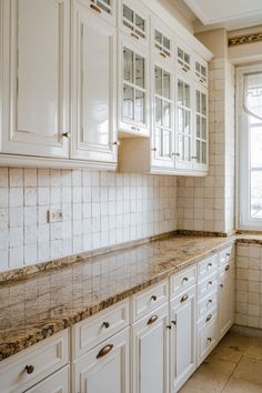 A beautifully designed kitchen with white subway tile backsplash, white and wood-toned cabinets, and a granite countertop. Cabinet Color Ideas, Kitchen Cabinet Color, Kitchen Cabinet Color Ideas, Cabinet Color, Kitchen Cabinet Colors, Cabinet Colors, Jewel Tones, Kitchen Cabinet, Spice Up