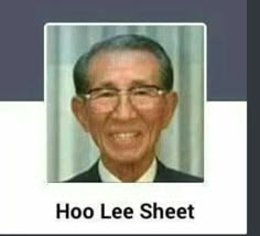 an old man wearing glasses and a suit smiling for the camera with text that reads hoo lee sheet