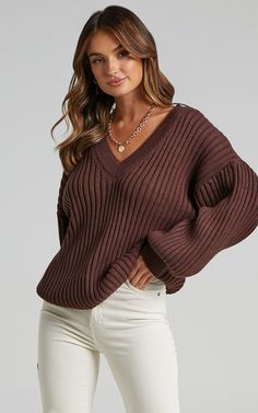 Let our Kartia V-neck Jumper keep you looking stylish and toasty this season! This semi-thick knit features a V-neckline, wide ribbed detail and long lantern sleeves. It is super versatile and will be your best friend during the colder months. Style it casually by half-tucking it into jeans and finishing it off with sneakers or keep it dressy with heels! Shop all Showpo .  Product Details Pull over style Drop shoulders Relaxed fit Ribbed No lining Size & Fit Size XS / 6 length: 63cm / 24.8in Fir Cute Bar Outfits, Night Out Outfit Classy, Bar Outfits, Style Aesthetics, V Neck Jumper, Jumper Outfit, Casual Day Outfits, Versatile Outfits, Weekend Outfit