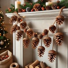 pine cones are hanging from the mantle