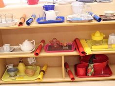 the shelves are filled with various kitchen items