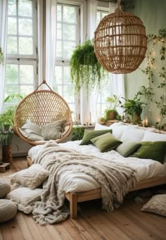 a bedroom with hanging plants and wicker furniture