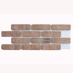 a brick wall that is made out of brown bricks and has white border around it