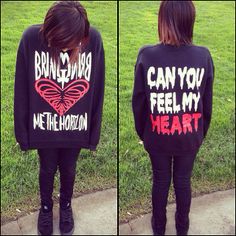 the back of a woman's sweatshirt that says, can you feel my heart?