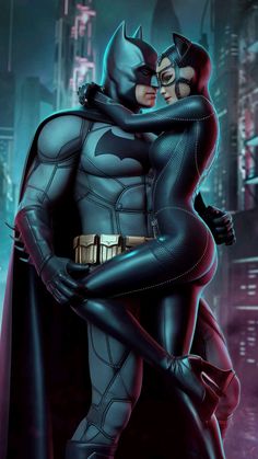 batman and catwoman hugging in the city