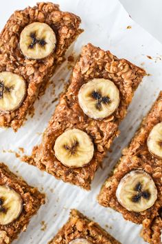 granola bars topped with sliced bananas and raisins