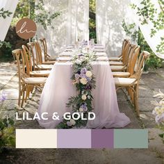 a table set up with flowers and greenery for an outdoor wedding reception in lilac & gold