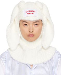 Shag knit nylon balaclava in white. Loose thread detailing throughout. · Ear appliqués at crown · Logo patch at face Supplier color: White White Fur Hat, Panama Hat Women, Fluffy Rabbit, Knitted Balaclava, Crown Logo, Trapper Hats, Hat Print, White Fur, Fur Hat