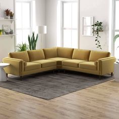 a living room scene with focus on the corner sofa