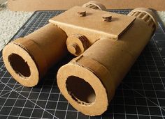 an image of a cardboard binoculars on the floor