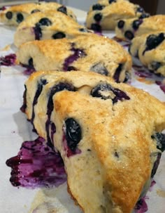 some blueberry scones are laying on the table