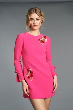 This Lily Dress in Electric Pink is designed to add an easy, stylish pop of color to any wardrobe. The hand embroidered florals make her a work of art. Crafted from a stretch crepe fabric, the mini dress is designed for comfort and all-day wear dressed up or down. Enjoy modern style with this classic piece.Details:Model is 5'8" Wearing A Size 2Full-Length, 33" from top of shoulder to bottom hemBack ZipperThick Stretch Crepe92% Polyester - 8% Spandex ImportedStyle #F241D04-966 Multicolor Embroidered Long Sleeve Embellished Dress, Embellished Long Sleeve Dress With Multicolor Embroidery, Spring Party Dress With Embroidered Sleeves, Fitted Spring Dress With 3d Embroidery, Fitted Long-sleeve Embroidered Dress With Floral Applique, Elegant Embroidered Pink Mini Dress, Elegant Pink Embroidered Mini Dress, Fitted Long Sleeve Embroidered Dress With Floral Applique, Pink Long Sleeve Dress With Floral Applique