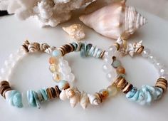 Larimar bracelets, blue beachy bracelets, seashell coastal bracelets, beachy boho bracelets, summer stacking bracelets, shell bracelets - Etsy 日本 Bracelets Seashell, Beachy Shell-shaped Bracelets For Gifts, Bracelets Beachy, Ocean-inspired Shell Bracelets For Beach, Ocean-inspired Shell Strand Bracelets, Ocean-inspired Shell Bracelets For Vacation, Coastal Bracelet, Bohemian Shell-shaped Beaded Bracelets For Beach, Bracelets Summer