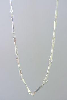 This modern style chain is made with sterling silver or solid white gold; its line are subtle and clean, original yet simple at the same time. A unique design, drawn and made by the artist for people who like simple and clean jewelry.  A ideal present  for birthday(anniversary), Mother's Days, wedding, Christmas or to offer itself to oneself! Modern Chain Necklace With Rectangular Links And Polished Finish, Modern Silver Necklace With Hooks And Links, Modern Polished Link Chain Necklace, Modern Sterling Silver Chain Necklace With Rectangular Links, Minimalist Polished Link Chain Necklace, Chain Necklace Women, Clean Jewelry, Handmade Chain, Women Chain