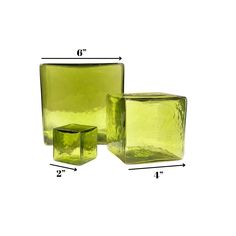 three square glass vases are shown with measurements