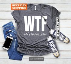 a t - shirt with the words, we're trying out? next day shipping