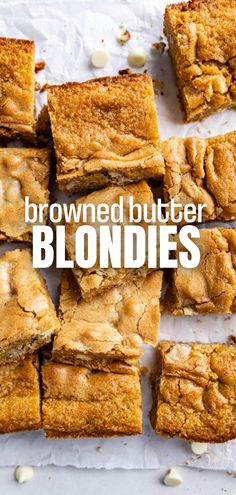 An overhead view of squares of browned butter blondies on parchment paper. Recipes Using Browned Butter, Duff's Blondie Recipe, Blonde Brownie Recipes, Blondes Recipe Blondie Brownies, Caramel Blondies Recipe, Blonde Recipe Brownies, Gooey Blondies Recipe, Browned Butter Brownies