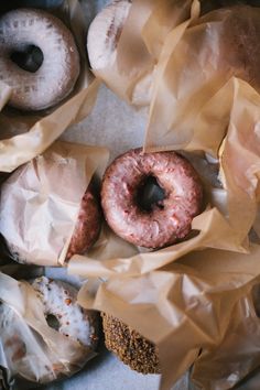 doughnuts and other pastries on wax paper