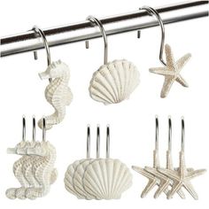 sea shells and starfish hangers on a metal bar