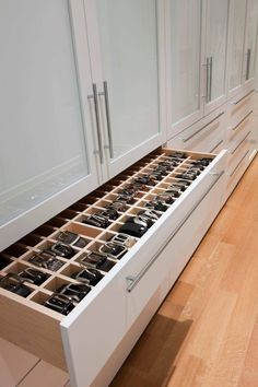 the drawers are filled with many different types of watches