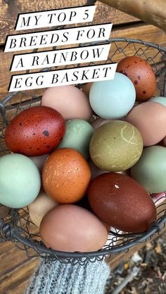 a basket filled with lots of different colored eggs