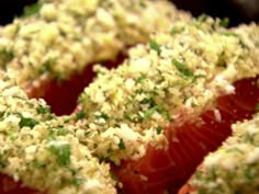 a close up of a doughnut with toppings on it's side,