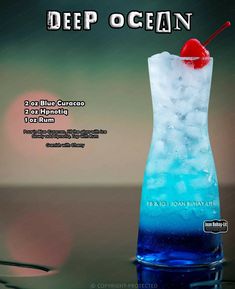 a blue curacco cocktail with a cherry on top is featured in the deep ocean magazine