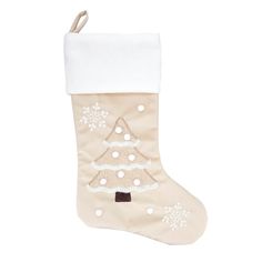 a stocking with a christmas tree on it and snowflakes hanging from the side