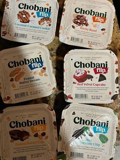 four packets of chobani mix sitting next to each other on top of a counter