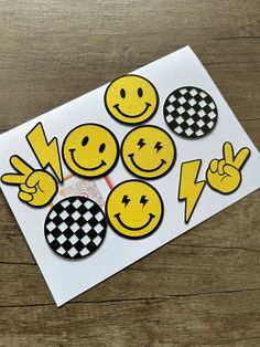 some yellow and black smiley face stickers