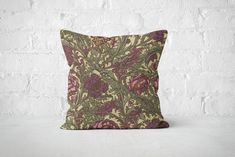 Create a luxurious atmosphere with this plum purple and moss green floral pillow cover, inspired by the timeless designs of William Morris. This rich pillow case is perfect for adding depth to your living room or bedroom and is made from high-quality materials for lasting elegance. Please note, pillow insert not included. - 100% Spun Polyester cover - Made from specially spun polyester threads, it retains it's shape, doesn't wrinkle so doesn't require ironing - Double sided print - Concealed zipper - Pillow not included Care Instructions Remove the pillows cover if it's removable. Pre-treat the stains with soft cloth or bristle brush that had been soaked in warm soap water. Machine wash, max 40oC, normal cycle. Do not bleach, do not tumble dry. Iron, steam or dry low heat only. Do not dry- Green Floral Pillow, Olive Decor, Floral Home Decor, William Morris Designs, Floral Pillow Cover, Floral Pillow, Green Home Decor, Floral Throw Pillows, Floral Pillows