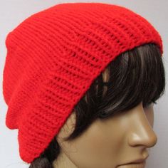 This beanie is a great basic slouch beanie, that will help you add a pop of color to any outfit while keeping warm during the cooler weather. This Beanie is already soft, but will only get softer the more that you wash and wear. This beanie is easy to wash on gentle and dry on low heat or allow to air dry. This beanie is a great addition to anyone's hat collection. I made this Beanie with Love and I hope that you or whomever you gift this hat to loves this beanie. For Every item I sell, a large Casual One Size Bonnet Cap, Casual Slouchy Crochet Cap, Casual Soft Knit Bonnet, One Size, Red Adjustable Casual Beanie, Casual Solid Color Bonnet, One Size, Casual Red Beanie One Size, Casual Red Winter Beanie, Casual Solid Color Bonnet, Casual Solid Crochet Hat With Soft Knit