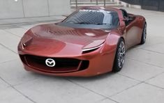 a red sports car parked in front of a building