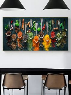 a table topped with lots of different types of spices and seasonings on top of it