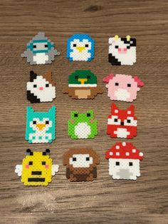 several different types of perler beads on a wooden table