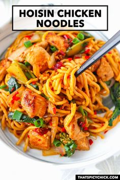 chicken noodle stir fry in a white bowl with chopsticks