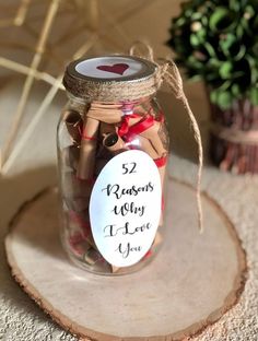 a mason jar filled with valentine's day treats