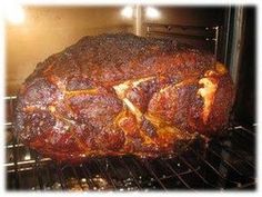 a large meat roasting in an oven