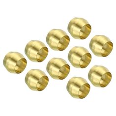 six brass knobs are shown in this image, and there is no image to describe