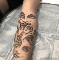 a person with a tattoo on their arm