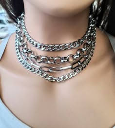 This handmade chunky stainless steel chain layered necklace set is a stunning piece of jewelry that is perfect for those who love bold and edgy accessories. The necklace features a 4-strand drop festoon design, adding depth and dimension to the piece. The chunky chain is made of sturdy stainless steel, ensuring its durability and longevity.  This necklace set is an excellent handmade gift for someone special. It is a perfect choice for those who love alternative and goth styles, as well as anyon Goth Styles, Chain Layered Necklace, Silver Bracelet Stack, Handmade Aesthetic, Goth Choker, Goth Necklace, Edgy Accessories, Y2k Necklace, Layered Chain