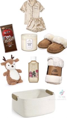 the contents of a gift set including slippers, socks, soap and other items