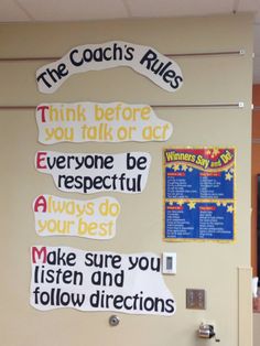 the coach's rules are posted on the wall in front of the classroom door