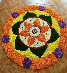 a colorful flower arrangement on the floor