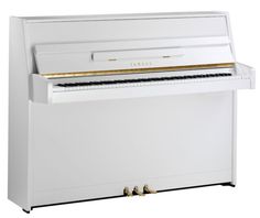 a white piano with gold accents on the top and bottom part, in front of a white background