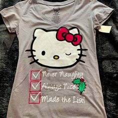 Hello Kitty Tshirt, Christmas Holiday Themed, Brand New, Size Medium Cute Cotton Holiday Tops, Cute Holiday Tops With Short Sleeves, Cute Short Sleeve Holiday Tops, Cute Letter Print Holiday Tops, Cute Letter Print Tops For Holiday, Cute Holiday Tops With Letter Print, Hello Kitty Tshirt, Hello Kitty Shirt, Christmas Tees