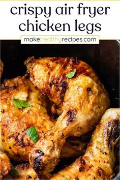 grilled chicken legs in a pan with text overlay that reads crispy air fryer chicken legs