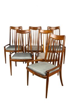 six mid century style dining chairs with upholstered seats